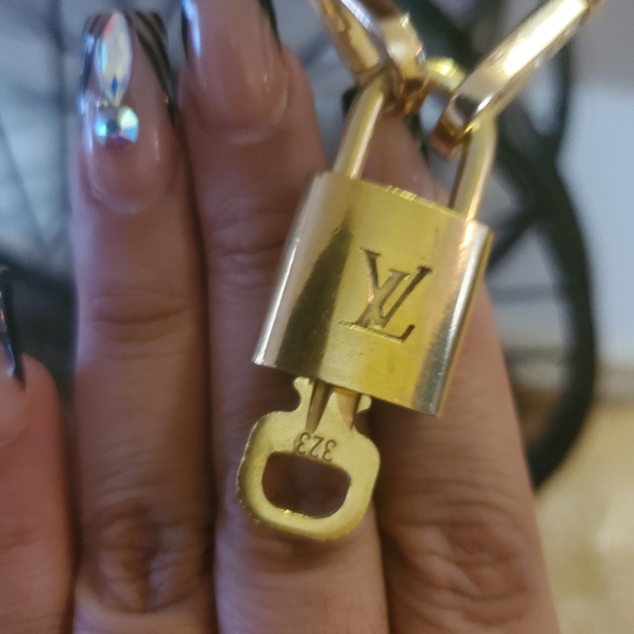 Louis Vuitton Authentic Lock with key. - Picture 5 of 10